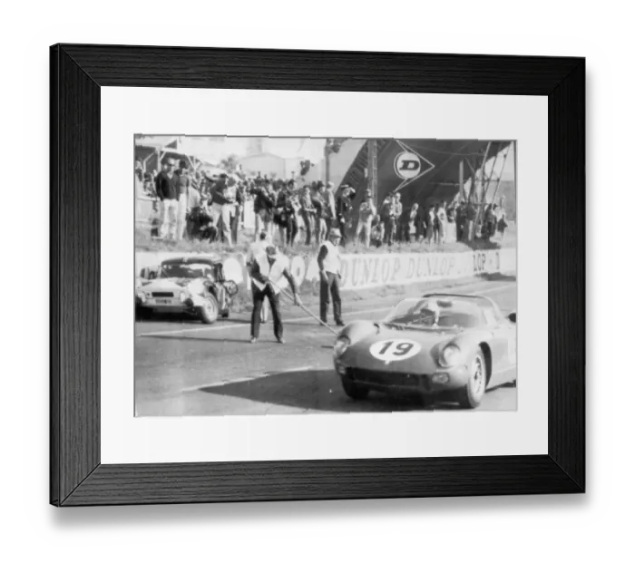 Framed Print : John Surtees in his Ferarri leading after 33 laps flashing past Mike Rothschild s Framed Print : John Surtees in his Ferarri leading after 33 laps flashing past Mike Rothschild s