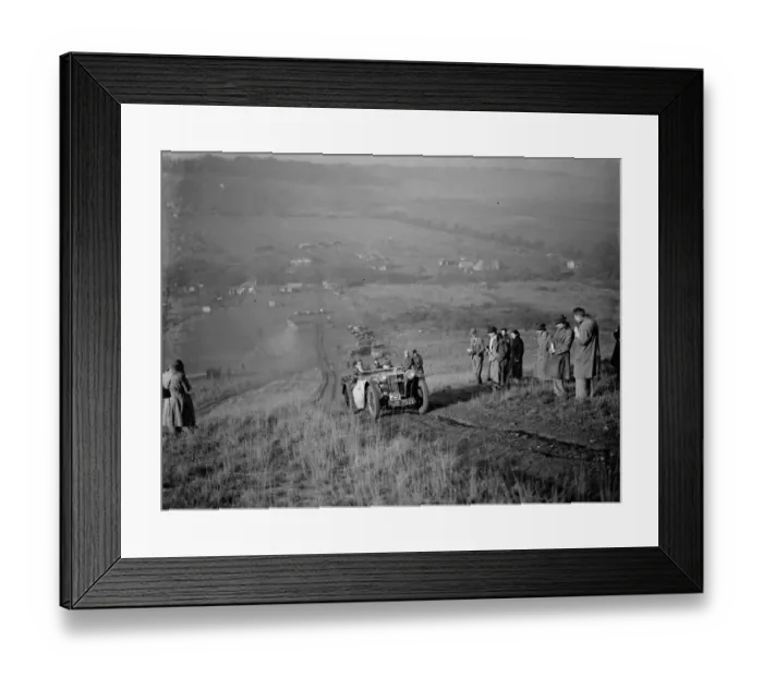 Framed Print : Kentish Border Car Club trial. A competitor struggles on the hill climb. 28 November Framed Print : Kentish Border Car Club trial. A competitor struggles on the hill climb. 28 November