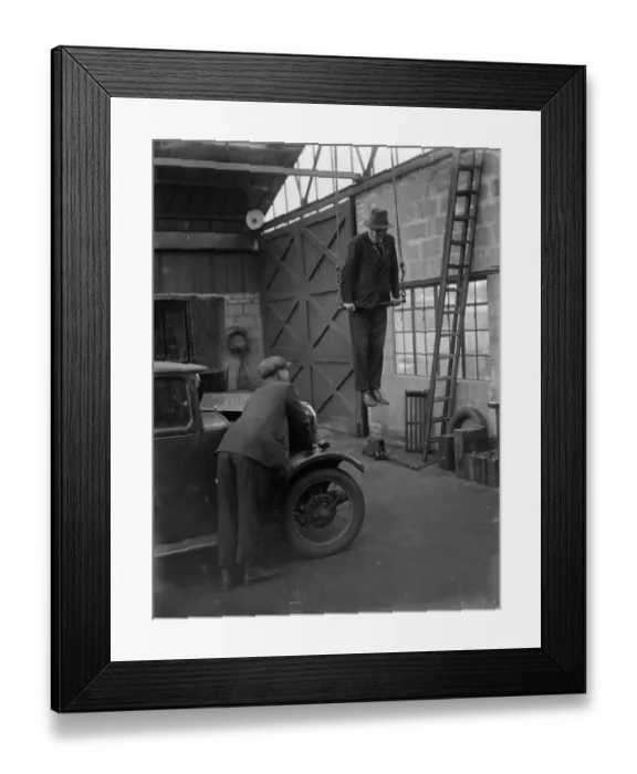 Framed Print : Mr Herbert Gilbertson on a trapeze in his garage in Sidcup. 1935 Framed Print : Mr Herbert Gilbertson on a trapeze in his garage in Sidcup. 1935
