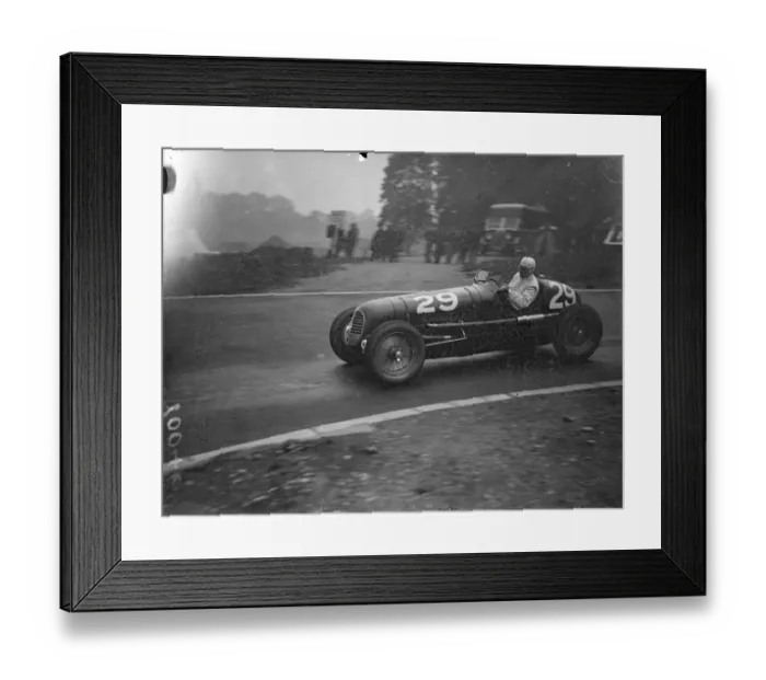 Framed Print : Count Trossi speeding round the track in his Maserati. Famous British and continental Framed Print : Count Trossi speeding round the track in his Maserati. Famous British and continental