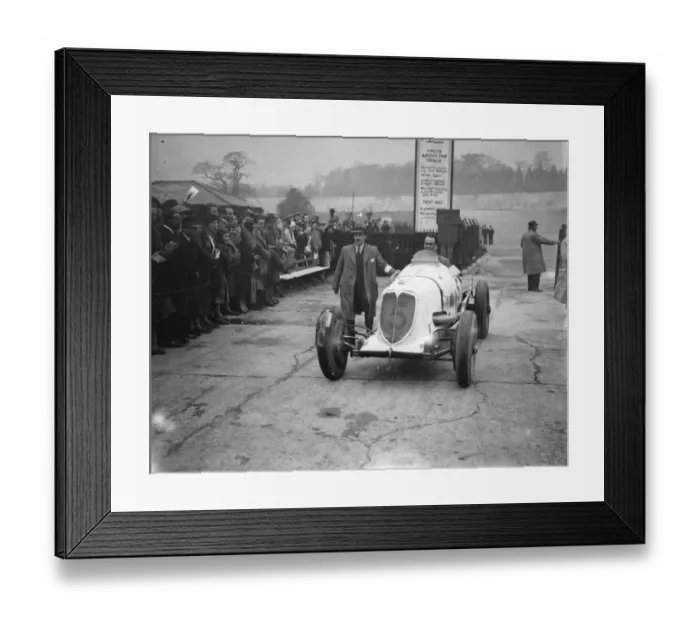 Framed Print : Brooklands races. Photo shows; Mr Whitney Straight driving his car back from the track Framed Print : Brooklands races. Photo shows; Mr Whitney Straight driving his car back from the track