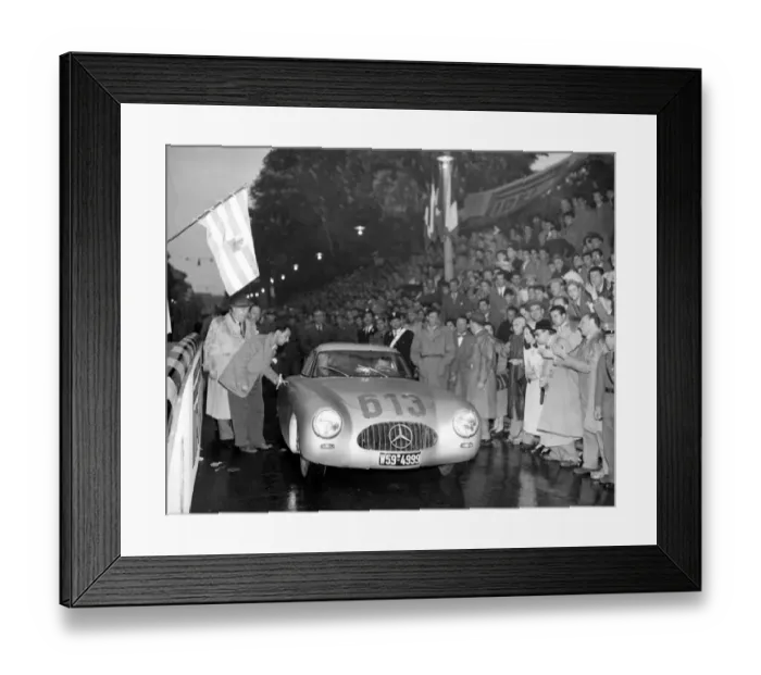 Framed Print : The Mercedes car of German pair Rudolph Caracciola and co-driver Kurrle prepares to leave Brescia