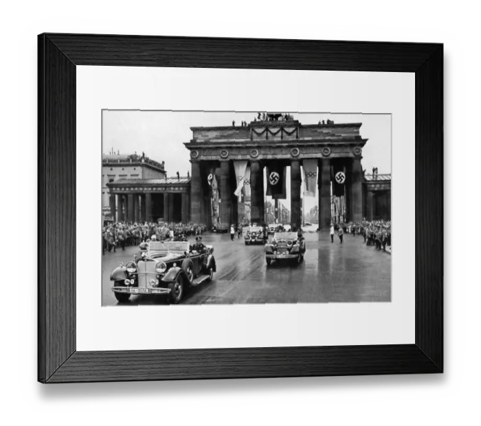 Framed Print : 1936 Olympics, Berlin - Adolf Hitler in an open top car leading a fleet of cars through Framed Print : 1936 Olympics, Berlin - Adolf Hitler in an open top car leading a fleet of cars through