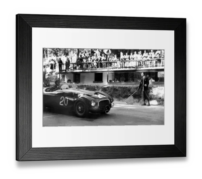 Framed Print : Luigi Chinetti in his Ferrari car passing the finishing line in the 24-hour race Framed Print : Luigi Chinetti in his Ferrari car passing the finishing line in the 24-hour race