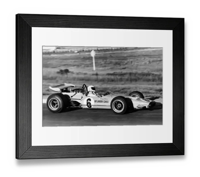 Framed Print : 1970 McLaren Ford M14A Formula 1 racing Denny Hulme at the wheel Framed Print : 1970 McLaren Ford M14A Formula 1 racing Denny Hulme at the wheel