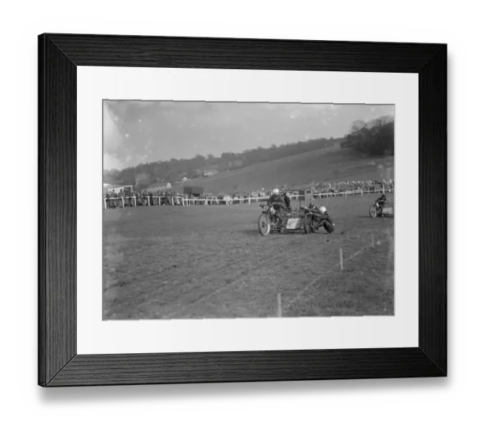 Framed Print : Motor cycling races at Brands Hatch. Two of the side car bikes jostle for position