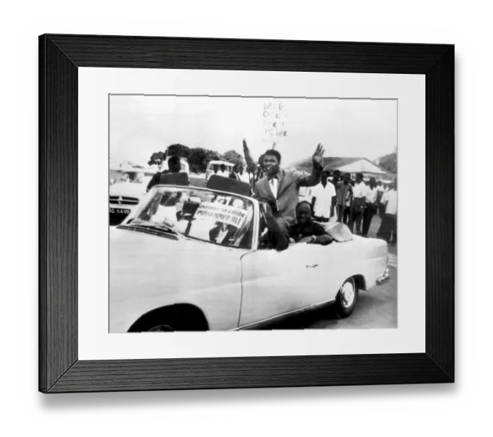 Framed Print : World Heavyweight Boxing Champion Cassius Clay rides in an open sports car as he