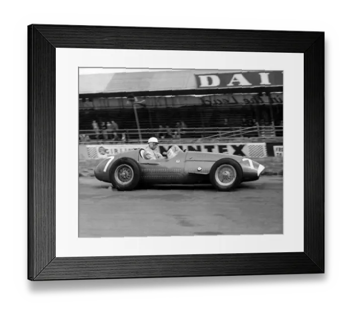 Framed Print : Stirling Moss driving a Maserati during a practice for the Grand Prix that takes
