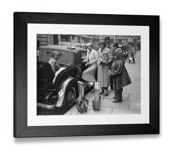Framed Print : Suzanne Lenglen with a dozen tennis rackets off for a day in the country. Mademoiselle Framed Print : Suzanne Lenglen with a dozen tennis rackets off for a day in the country. Mademoiselle