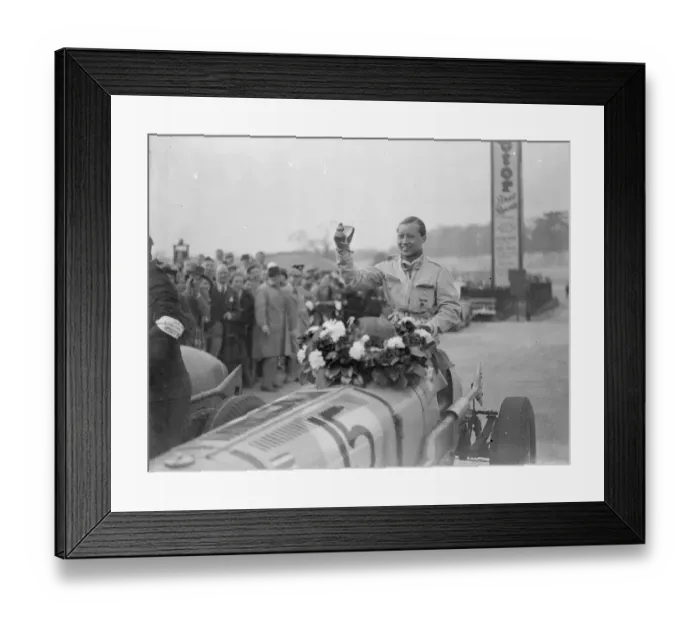 Framed Print : Prince Bira wins international trophy race. Prince Birs of Siam driving an E R