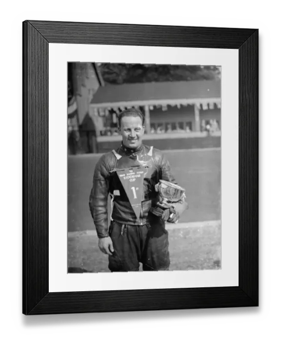 Framed Print : The Crystal Palace Road Racing. J H T Smith, the racing car driver, poses with his trophy Framed Print : The Crystal Palace Road Racing. J H T Smith, the racing car driver, poses with his trophy