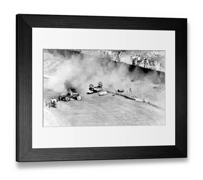 Framed Print : Phil Lacatiers driver car blazing on the track with Lacatier lies prone beside Framed Print : Phil Lacatiers driver car blazing on the track with Lacatier lies prone beside