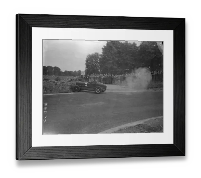 Framed Print : Mr H. L. Brooke, driving an MG Riley, again hit the banking, at exactly the same spot as before Framed Print : Mr H. L. Brooke, driving an MG Riley, again hit the banking, at exactly the same spot as before