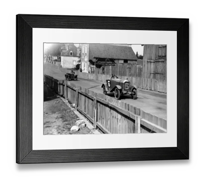 Framed Print : A Mathis car in 1923, a six-cylinder model, driving along a track Framed Print : A Mathis car in 1923, a six-cylinder model, driving along a track