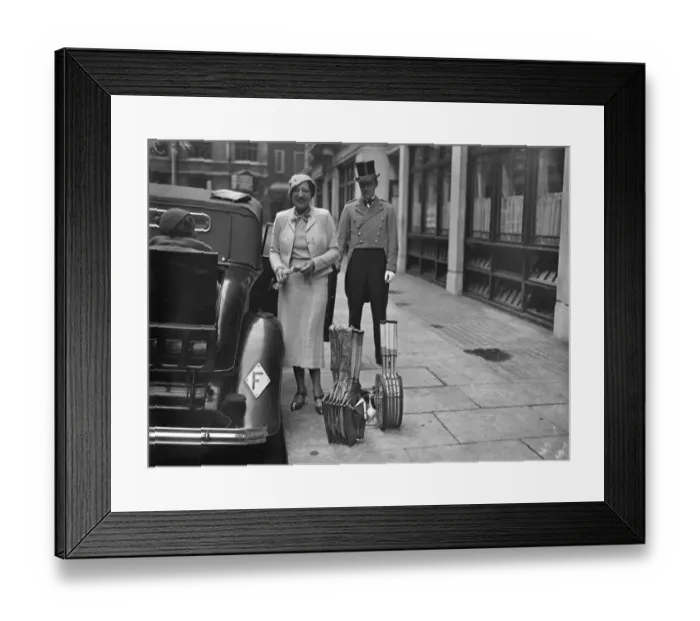 Framed Print : Suzanne Lenglen with a dozen tennis rackets off for a day in the country. Mademoiselle Framed Print : Suzanne Lenglen with a dozen tennis rackets off for a day in the country. Mademoiselle
