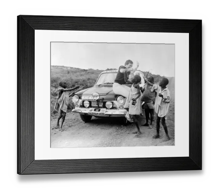 Framed Print : Nr Nairobi, Kenya : British rally driver Pat Moss with East African boys sat Framed Print : Nr Nairobi, Kenya : British rally driver Pat Moss with East African boys sat