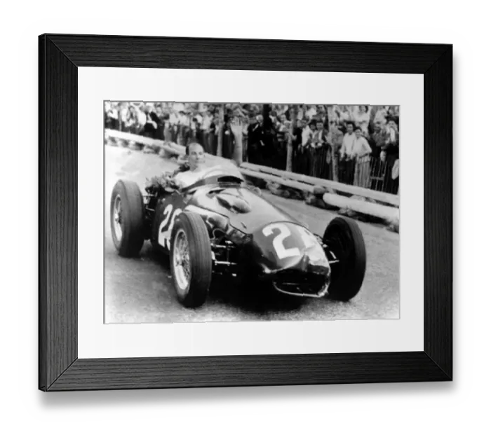 Framed Print : British racing driver Stirling Moss, 26, makes a lap of honour following his victory Framed Print : British racing driver Stirling Moss, 26, makes a lap of honour following his victory