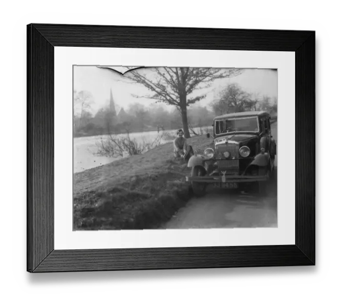 Framed Print : A solitary skater puts on her skates before going out on the ice in Chislehurst. 1936