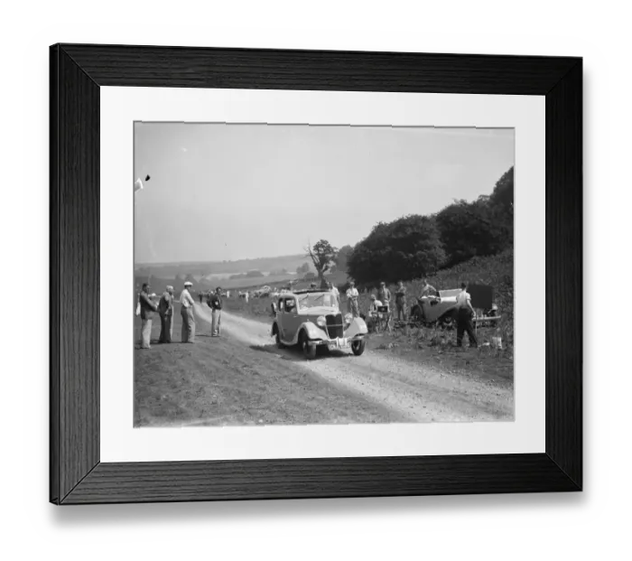 Framed Print : A car struggle over the summit in the up hill rally. 1936