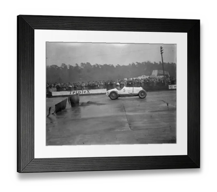 Framed Print : Brooklands races. Photo shows; Mr Whitney Straight speeding down the track. 28