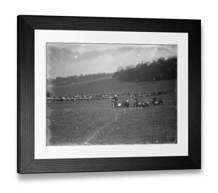 Framed Print : Motor cycling races at Brands Hatch. The side car bikes take a corner during Framed Print : Motor cycling races at Brands Hatch. The side car bikes take a corner during