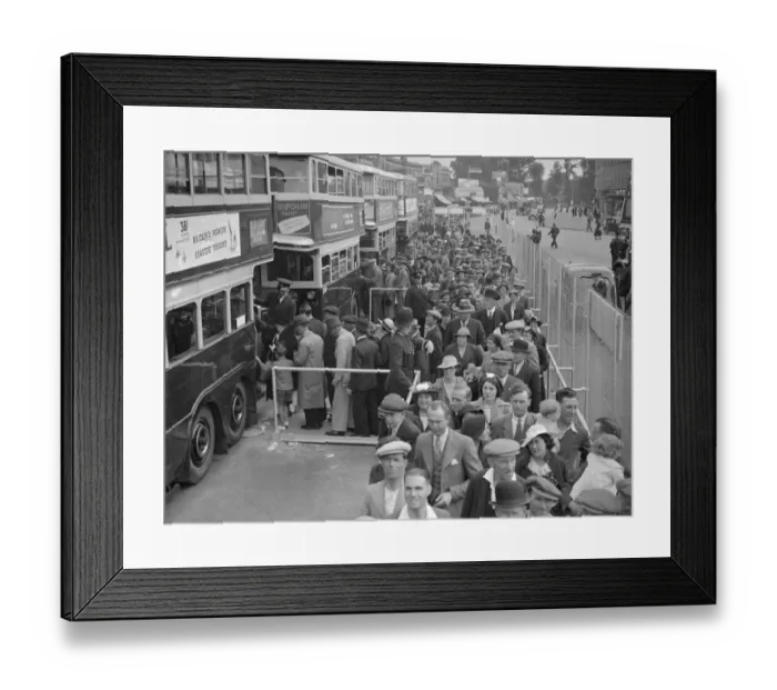 Framed Print : The Epsom Derby Summer Race Meeting. Derby Day crowds boarding buses at Morden Framed Print : The Epsom Derby Summer Race Meeting. Derby Day crowds boarding buses at Morden