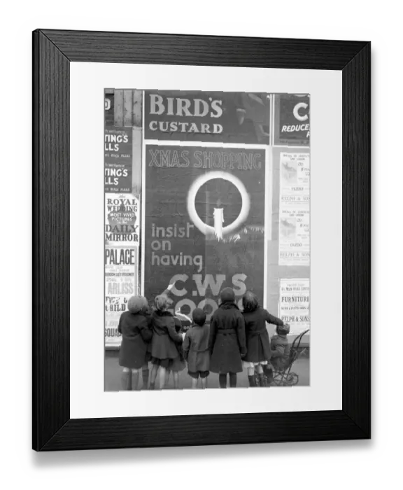 Framed Print : Children look up at a CWS poster. 1934