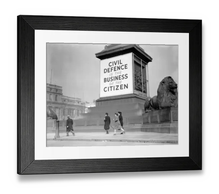 Framed Print : War Crisis, 1939. Air Raid precautions Civil Defence poster in Trafalgar Square Framed Print : War Crisis, 1939. Air Raid precautions Civil Defence poster in Trafalgar Square