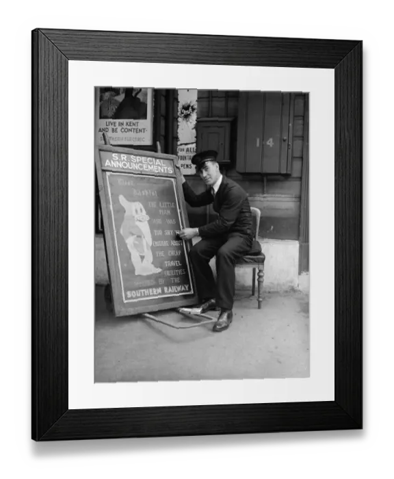 Framed Print : Railway porter sign writer Mr E A Burgar. 1938 Framed Print : Railway porter sign writer Mr E A Burgar. 1938