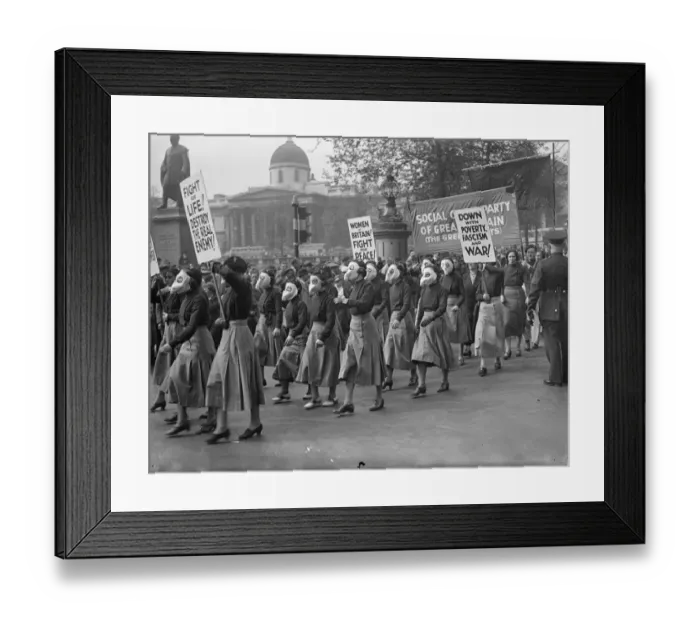 Framed Print : Masked women lead demonstrators in Trafalgar Square peace meeting. Led by women