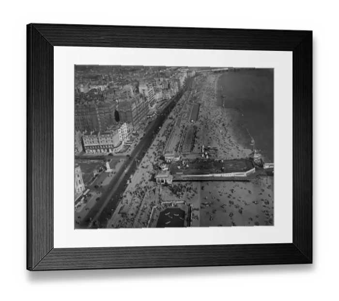 Framed Print : Hastings beach photographed from the air wih hundreds of holiday makers enjoying the beach Framed Print : Hastings beach photographed from the air wih hundreds of holiday makers enjoying the beach