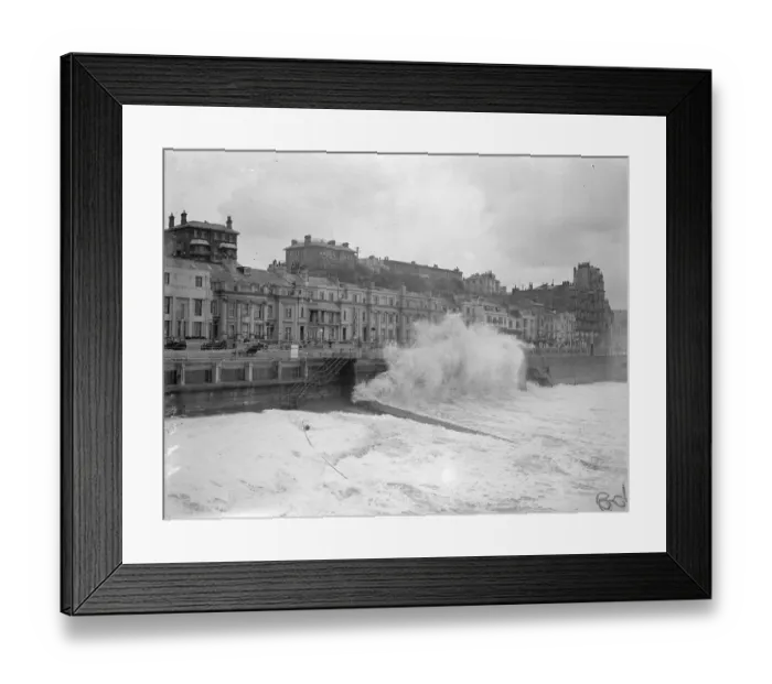 Framed Print : Bursting in fury against the sea wall, huge waves lashed to a white fury by the gale Framed Print : Bursting in fury against the sea wall, huge waves lashed to a white fury by the gale