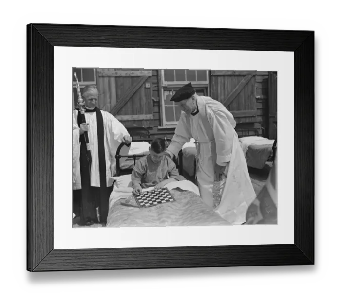 Framed Print : Bishop of London ( Arthur Winnington-Ingram ) with one of the little patients during