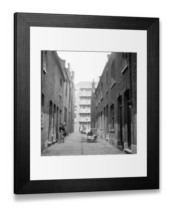 Framed Print : Living with the old and the new in post - war Wapping, East London. A mother Framed Print : Living with the old and the new in post - war Wapping, East London. A mother