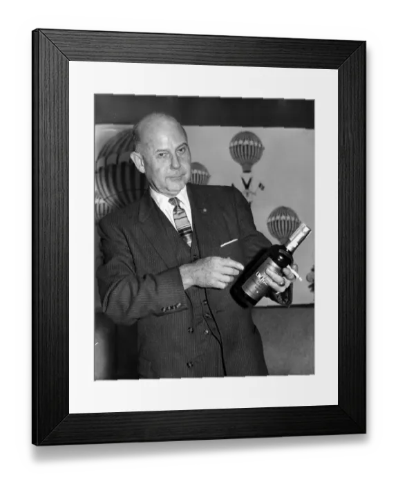 Framed Print : Vice Admiral William J. Marshall holding a bottle of bourbon and a cigarette. 2 Framed Print : Vice Admiral William J. Marshall holding a bottle of bourbon and a cigarette. 2