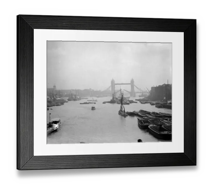Framed Print : London. River Thames with barges and boats with the Tower Bridge in the back Framed Print : London. River Thames with barges and boats with the Tower Bridge in the back
