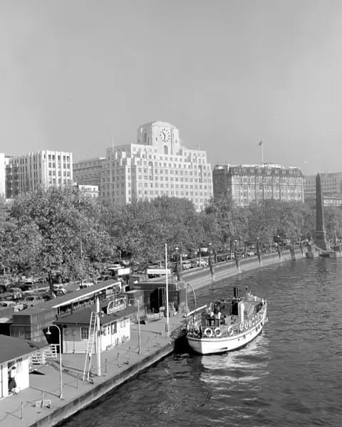 Thames River Boats with Cleopatras Needle and the Shell Mex House ( art deco style 1930 - 1931 )