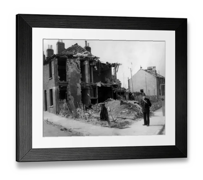 Framed Print : Home front 1940. An end of terrace house destroyed after a raid on Eltham by German Framed Print : Home front 1940. An end of terrace house destroyed after a raid on Eltham by German