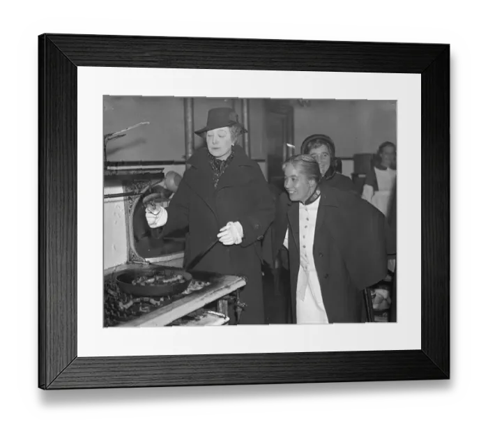 Framed Print : Premiers wife, fries sausages, during East end hostel visit. Mrs Neville Chamberlain Framed Print : Premiers wife, fries sausages, during East end hostel visit. Mrs Neville Chamberlain