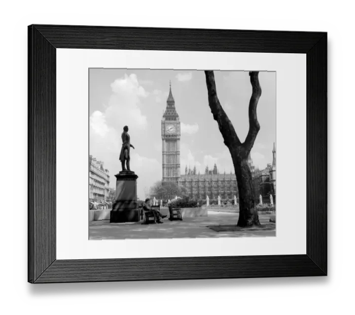 Framed Print : A man relaxes by the statue of Viscount Palmerston in Parliament Square with Big Ben Framed Print : A man relaxes by the statue of Viscount Palmerston in Parliament Square with Big Ben