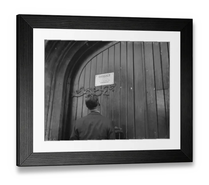 Framed Print : A warning sign on the door of a church building where an electric transformer station Framed Print : A warning sign on the door of a church building where an electric transformer station
