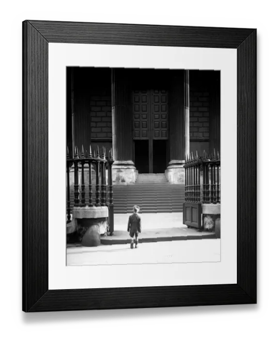 Framed Print : A small boy dwarfed by the imposing columns and steps to the entrance of St Pauls Cathedral Framed Print : A small boy dwarfed by the imposing columns and steps to the entrance of St Pauls Cathedral