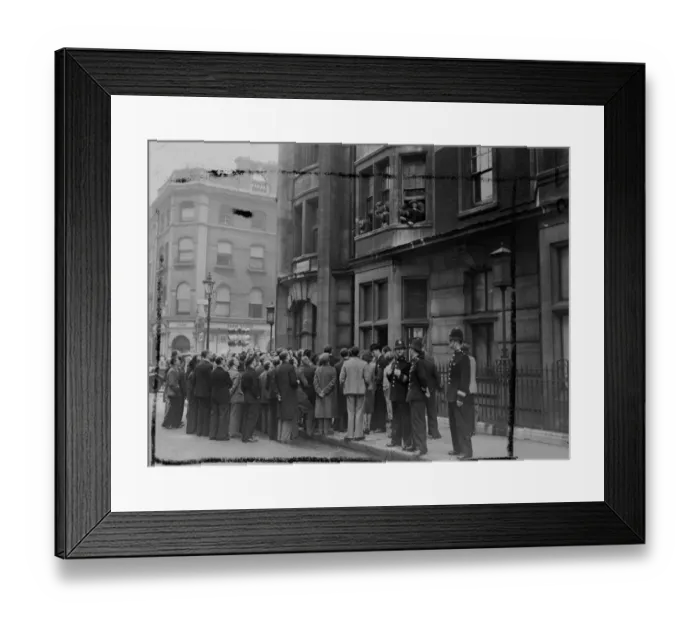 Framed Print : A crowd gathered outside the Ivanhoe hotel, Bloomsbury, London today. To listen to Framed Print : A crowd gathered outside the Ivanhoe hotel, Bloomsbury, London today. To listen to