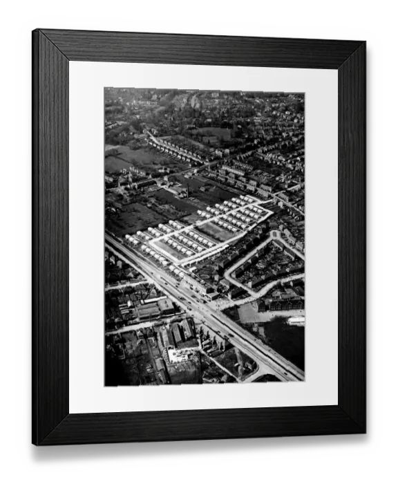 Framed Print : This prefab estate fits in admirably with its surroundings. The picture is taken Framed Print : This prefab estate fits in admirably with its surroundings. The picture is taken