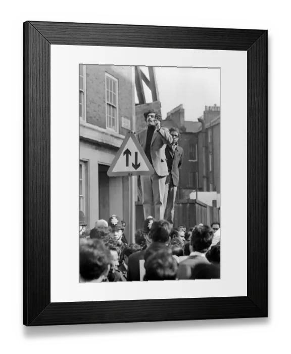 Framed Print : London: Pakistani-born student leader Tariq Ali stands a top pillar-box near