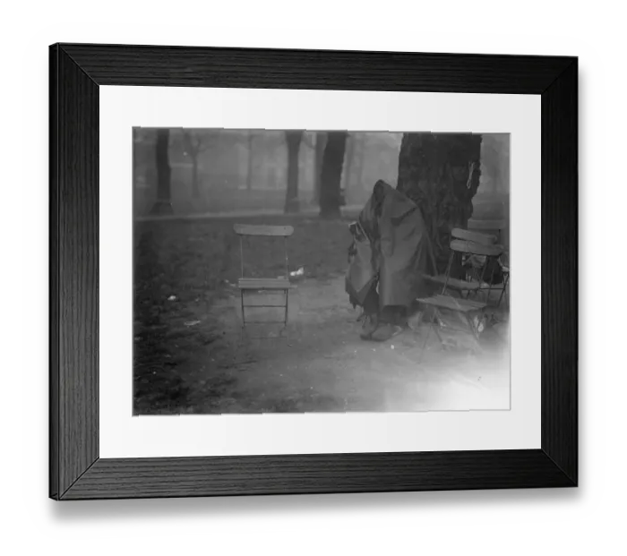 Framed Print : A pathetic scene in Londons cold. A human derelict. a women huddled beneath
