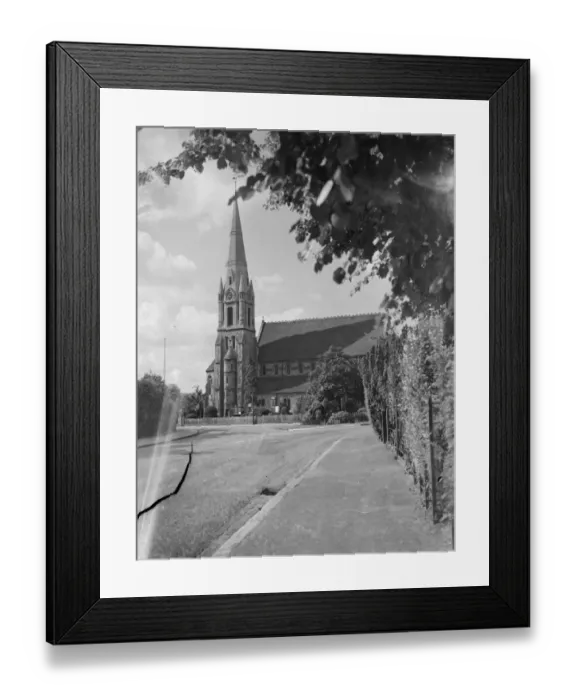 Framed Print : An exterior view of St John the Evangelist church in Bexley, London. 1939 Framed Print : An exterior view of St John the Evangelist church in Bexley, London. 1939