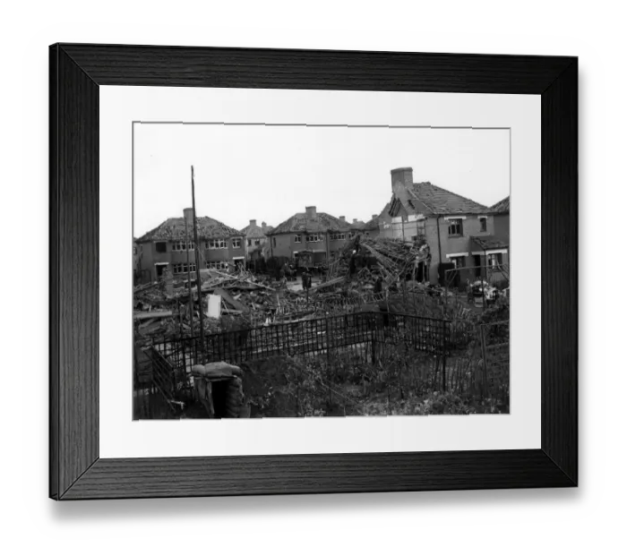 Framed Print : Home front 1940. A residential area showing signs of being heavily damaged after
