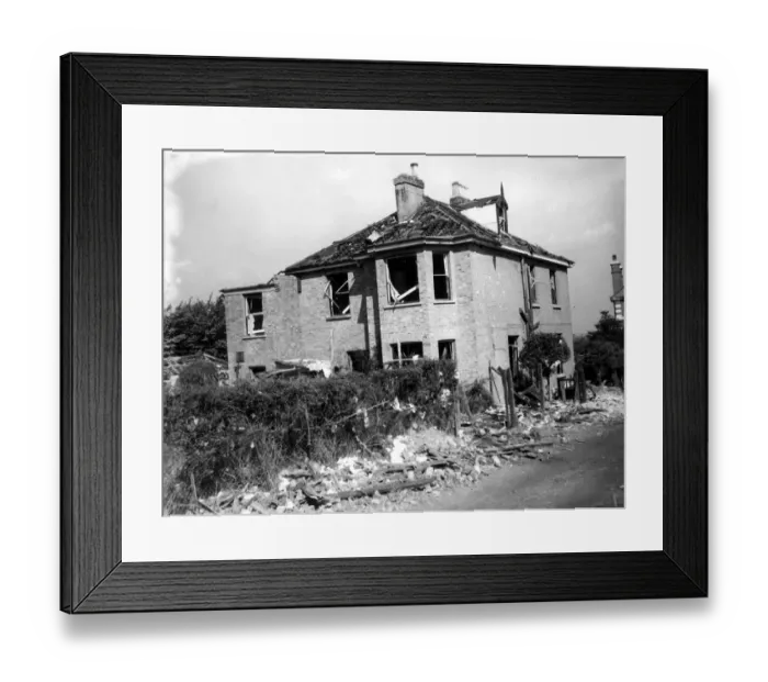 Framed Print : Home front 1940. A house in the Bexley area, showing considerable damage, surrounded Framed Print : Home front 1940. A house in the Bexley area, showing considerable damage, surrounded