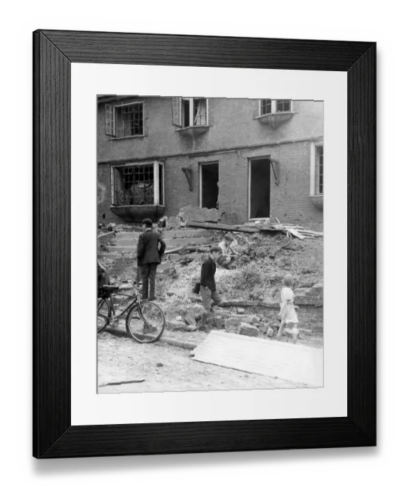 Framed Print : Home front 1940. Children in amongst the debris and rubble of Northfleet houses Framed Print : Home front 1940. Children in amongst the debris and rubble of Northfleet houses